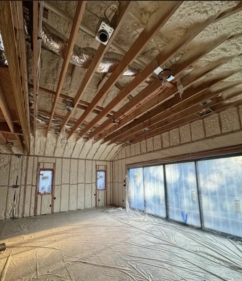 Interior walls and ceiling insulated with spray foam during new construction in Rhinelander